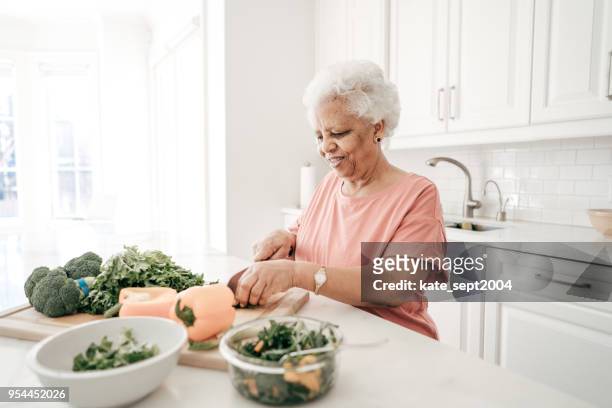 senior life - person of colour stock pictures, royalty-free photos & images