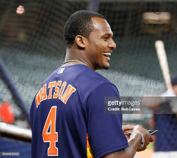 DeShaun Watson of the Houston Texans visits batting practice at Minute Maid Park on May 1, 2018 in Houston, Texas.