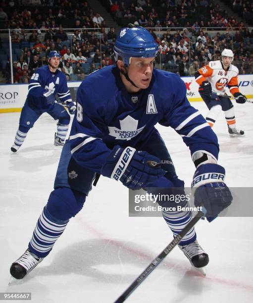 Mike Komisarek of the Toronto Maple Leafs skates against the New York Islanders at Nassau Coliseum on December 23, 2009 in Uniondale, New York.