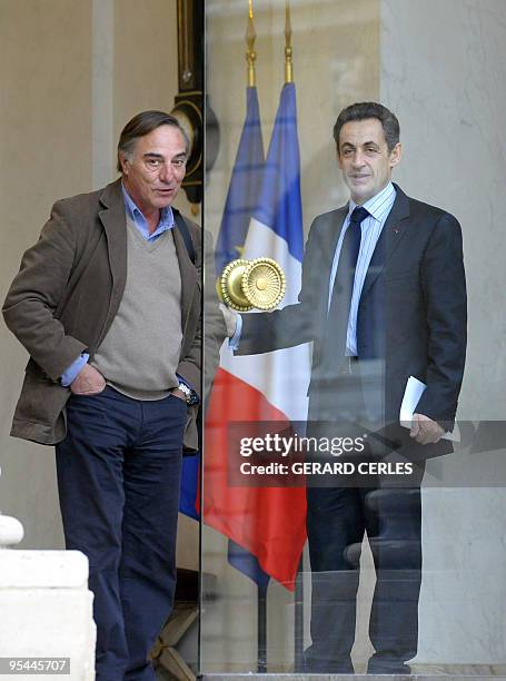 French President Nicolas Sarkozy chats with Ecologist activist Allain Bougrain-Dubourg after a meeting focusing on the Copenhagen climate accord at...