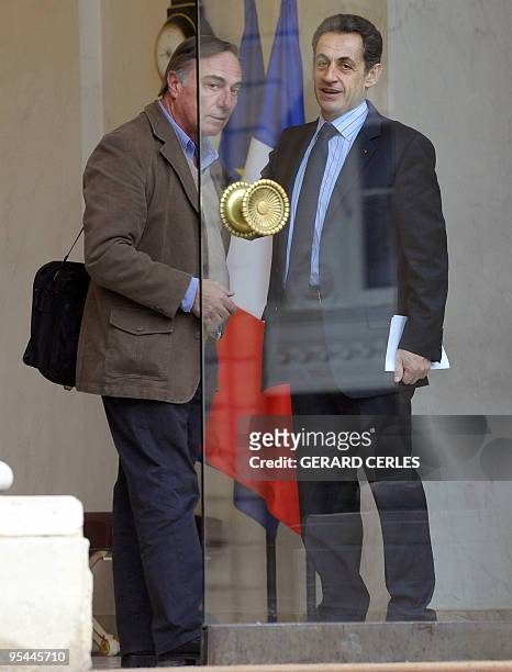 French President Nicolas Sarkozy chats with Ecologist activist Allain Bougrain-Dubourg after a meeting focusing on the Copenhagen climate accord at...