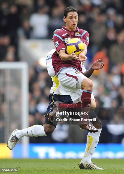 Guillermo Franco of West Ham controls the ball with his arms during the Barclays Premier League match between Tottenham Hotspur and West Ham United...