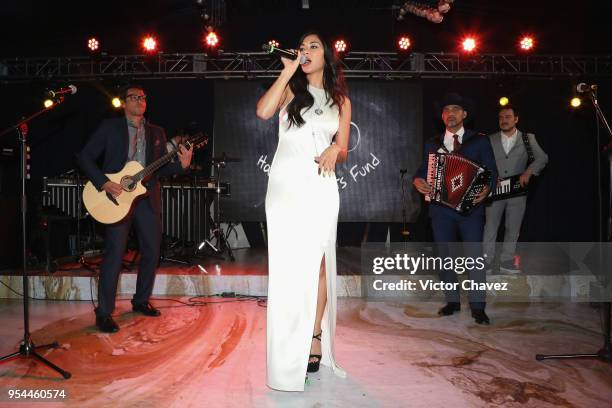 Nicole Scherzinger and Los Hijos de Frida perform on stage during the Happy Hearts Fundation Mexico 10th Anniversary at Four Seasons Hotel on May 3,...