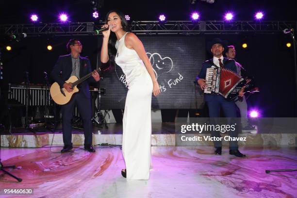 Nicole Scherzinger and Los Hijos de Frida perform on stage during the Happy Hearts Fundation Mexico 10th Anniversary at Four Seasons Hotel on May 3,...