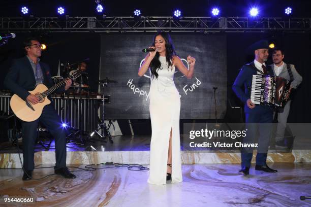 Nicole Scherzinger and Los Hijos de Frida perform on stage during the Happy Hearts Fundation Mexico 10th Anniversary at Four Seasons Hotel on May 3,...