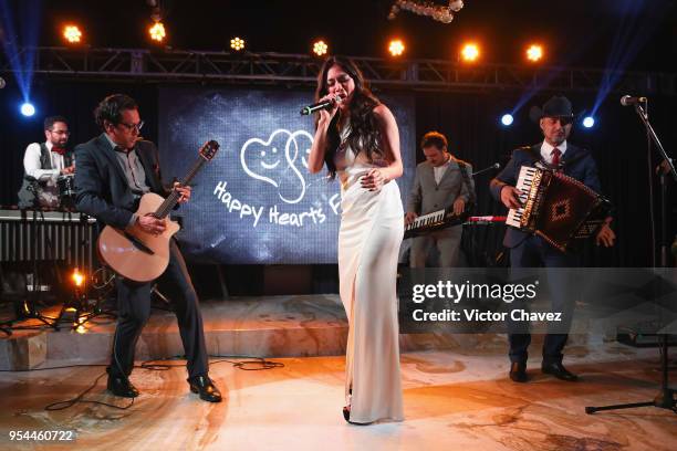 Nicole Scherzinger and Los Hijos de Frida perform on stage during the Happy Hearts Fundation Mexico 10th Anniversary at Four Seasons Hotel on May 3,...