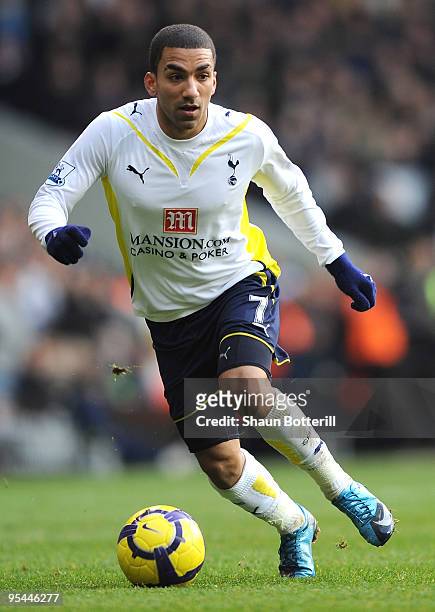 Aaron Lennon of Tottenham Hotspur runs with the ball during the Barclays Premier League match between Tottenham Hotspur and West Ham United at White...