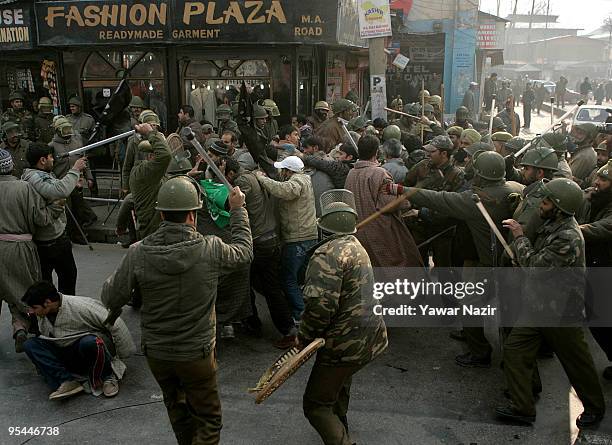 Indian policemen clash with Kashmiri Shiite Muslims during a protest against ban on Ashura in Srinagar, India on December 28, 2009. Ashura is a 10...