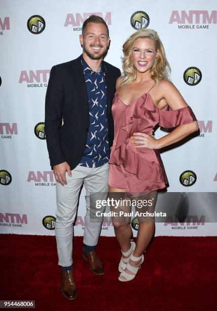 Singer / Actress Kimberly Caldwell-Harvey and Professional Soccer Player Jordan Harvey attend the release of the "America's Next Top Model" mobile...