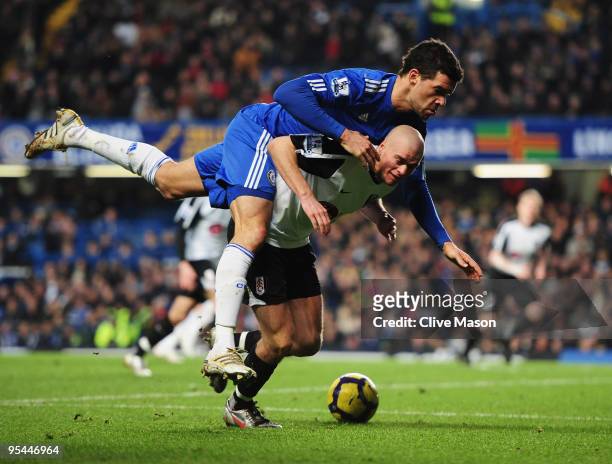 Paul Konchesky of Fulham battles with Michael Ballack of Chelsea during the Barclays Premier League match between Chelsea and Fulham at Stamford...