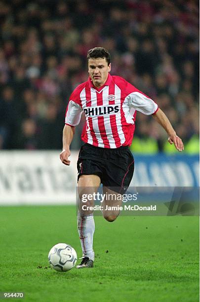 Yuri Nikiforov of PSV Eindhoven runs with the ball during the UEFA Cup Quarter Finals second leg match against Kaiserslautern played at the Philips...