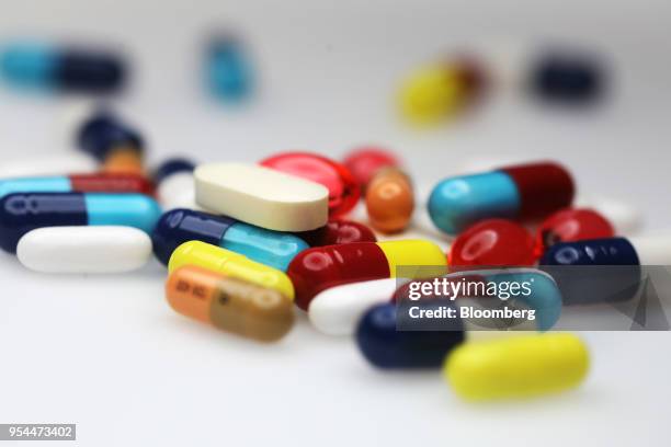 Brightly coloured pharmaceutical medication, including antibiotics, paracetamol, Ibuprofen and cold relief tablets, manufactured by a variety of...