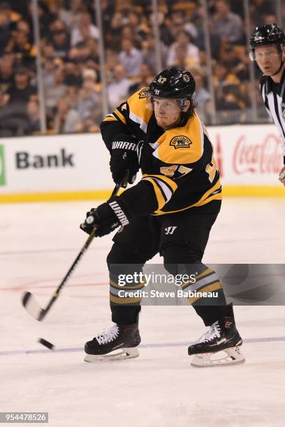 Torey Krug of the Boston Bruins passes the puck against the Tampa Bay Lightning in Game Three of the Eastern Conference Second Round during the 2018...