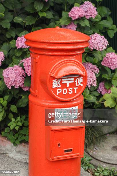 old-fashioned and red-colored post box and hydrangea in japan - e mail ストックフォトと画像