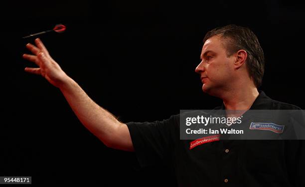 John Part of Canada in action against Kirk Shepherd of England during the 2010 Ladbrokes.com World Darts Championship Round One at Alexandra Palace...