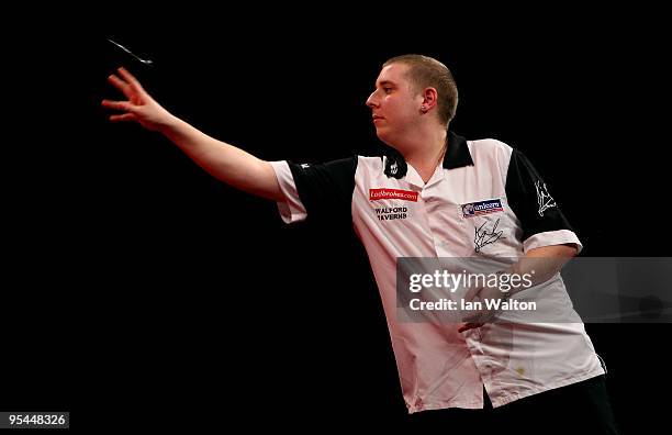 Kirk Shepherd of England in action winning against John Part of Canada during the 2010 Ladbrokes.com World Darts Championship Round One at Alexandra...