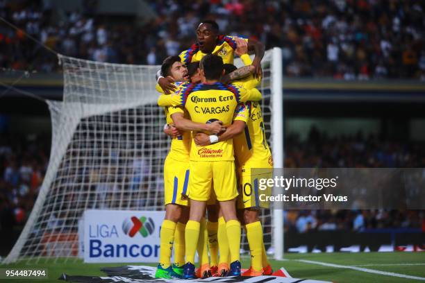 Jeremy Menez of America celebrate with teammates after scoring the second goal of his team during the quarter finals first leg match between Pumas...