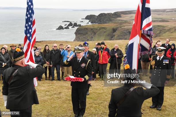 Captain Mark Rudesill Naval Attache, United States Nav lays a wreath, as a service is held at the American monument on Islay's Mull of Oa to mark the...