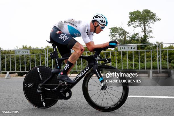 British rider Christopher Froome rides after a crash during reconnaissance of the route in the 9,7 km 1st stage of the 101th Giro d'Italia, Tour of...