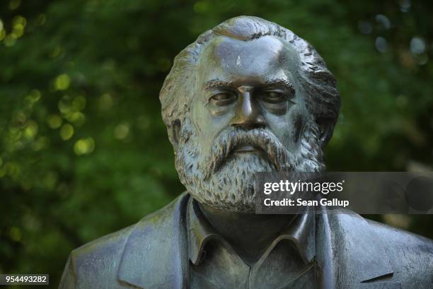 Statue of philosopher and revolutionary Karl Marx stands in a public park on May 4, 2018 in Berlin, Germany. The German city of Trier, Marx's...