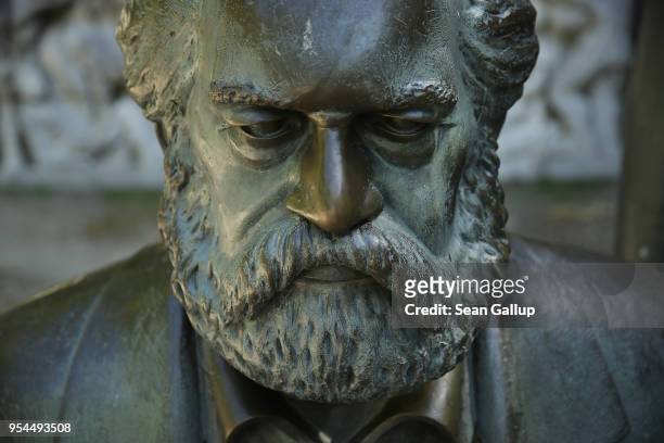Statue of philosopher and revolutionary Karl Marx stands in a public park on May 4, 2018 in Berlin, Germany. The German city of Trier, Marx's...