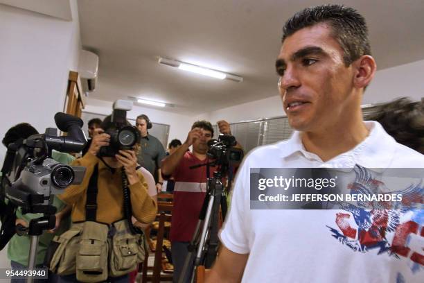 Brazilian footballer Lucio, arrives at a press conference at a hotel in Porto Alegre, southern Brazil, on July 13th, 2006. Lucio spoke about the...