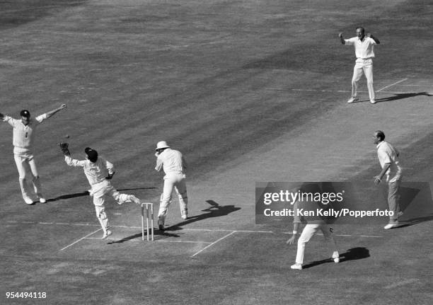 West Indies captain Clive Lloyd is caught behind for 50 runs by England wicketkeeper Alan Knott off the bowling of Derek Underwood during the 2nd...