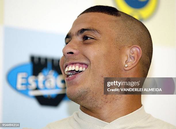 Brazilian soccer star, Ronaldo Nazario , smiles after inaugurating the new Physiotherapy Faculty R9 at the Universidad Estacio de Sa, in Rio de...