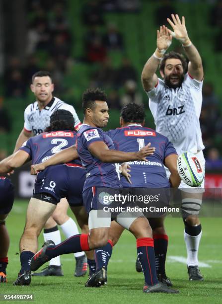 Will Genia of the Rebels kicks the ball during the round 12 Super Rugby match between the Rebels and the Crusaders at AAMI Park on May 4, 2018 in...