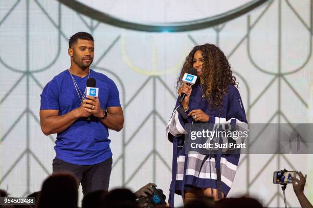 Seattle Seahawks quarterback Russell Wilson and singer Ciara speak at WE Day at Key Arena on May 3, 2018 in Seattle, Washington.