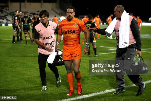 Joaquin Tuculet of the Jaguares leaves the field injured during the round 12 Super Rugby match between the Chiefs and the Jaguares at Rotorua...