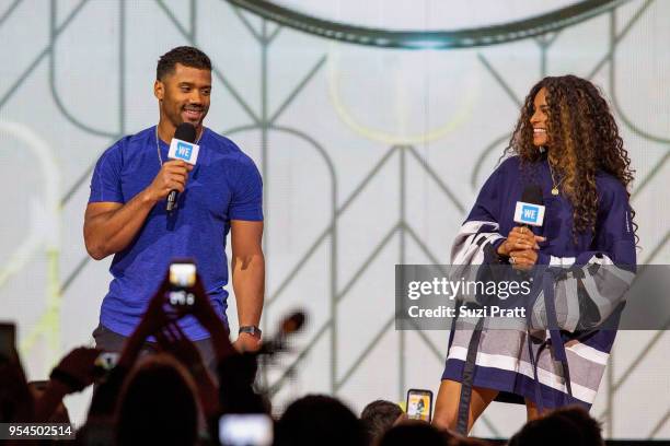 Seattle Seahawks quarterback Russell Wilson and singer Ciara speak at WE Day at Key Arena on May 3, 2018 in Seattle, Washington.