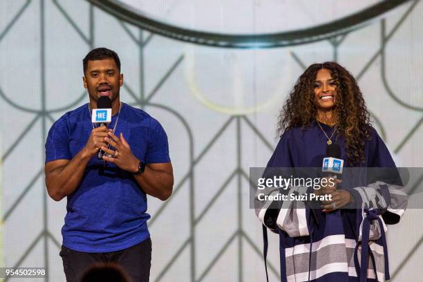 Seattle Seahawks quarterback Russell Wilson and singer Ciara speak at WE Day at Key Arena on May 3, 2018 in Seattle, Washington.