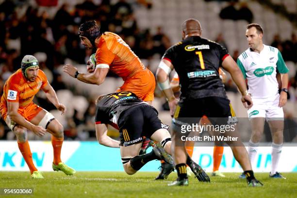 Tomas Lavanini of the Jaguares is tackled during the round 12 Super Rugby match between the Chiefs and the Jaguares at Rotorua International Stadium...