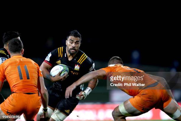 Liam Messam of the Chiefs is tackled during the round 12 Super Rugby match between the Chiefs and the Jaguares at Rotorua International Stadium on...