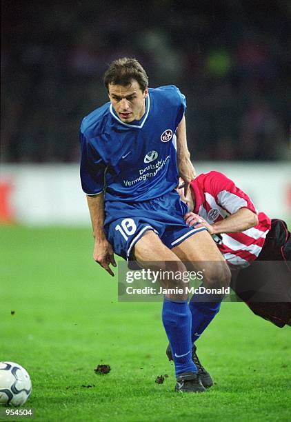Vratislav Lokvenc of Kaiserslautern holds the ball up during the UEFA Cup Quarter Finals second leg match against PSV Eindhoven played at the Philips...