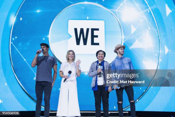 Jack Gilinsky, Olivia Holt, Anthony Gonzalez and Jack Johnson speak on stage during WE Day at KeyArena on May 3, 2018 in Seattle, Washington.