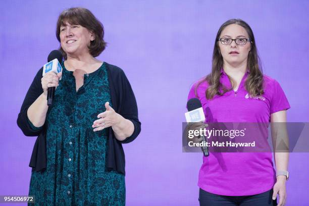 Of the 2018 Special Olympics USA Games Jayme Powers and Special Olympics Athlete Devon Adelman speak on stage during WE Day at KeyArena on May 3,...