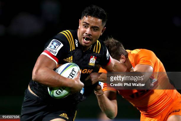 Anton Lienert-Brown of the Chiefs is tackled during the round 12 Super Rugby match between the Chiefs and the Jaguares at Rotorua International...