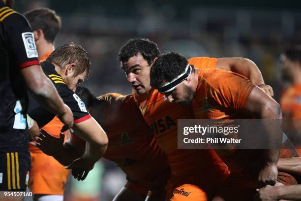 The Jaguares front row form the scrum during the round 12 Super Rugby match between the Chiefs and the Jaguares at Rotorua International Stadium on...