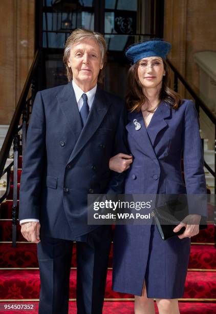 Sir Paul McCartney and his wife Nancy Shevell arrive for his Investiture, where he will be made a Companion of Honour at Buckingham Palace on May 4,...