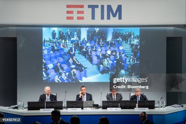 Left to right, Roberto Capone, chairman of the board of statutory auditors of Telecom Italia SpA, Amos Genish, chief executive officer of Telecom...