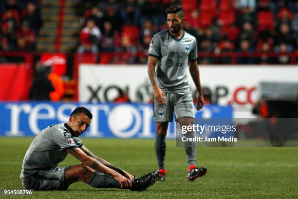 Leonel Vangioni and Jonathan Urretaviscaya of Monterrey react during the quarter finals first leg match between Tijuana and Monterrey as part of the...