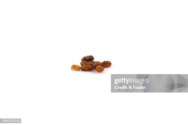 sweet dry raisins isolated on the white background - raisin stock pictures, royalty-free photos & images