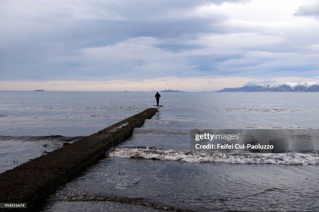 One Fisherman at Saudarkrokur, north Iceland