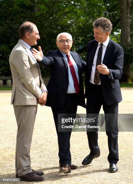 Jonathan Powell, former Downing Street Chief of Staff and chief British negotiator on Northern Ireland, poses next to Brian Currin , member of the...
