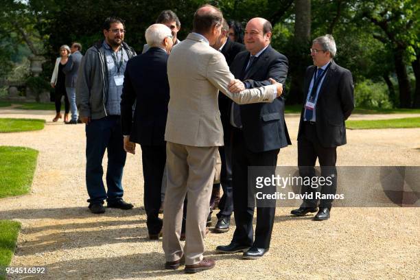 Andoni Ortuzar, President of the Basque Nationalist Party , greets Brian Currin, member of the International Contact Group as he arrives at the...