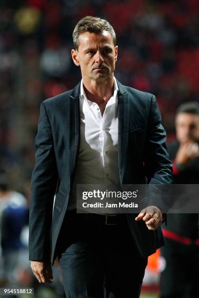 Diego Cocca, coach of Tijuana leaves the field at the end of the quarter finals first leg match between Tijuana and Monterrey as part of the Torneo...