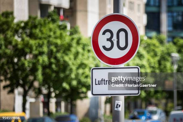 Traffic sign for speed limit and with the lettering 'Luftreinhaltung' is pictured in the city center on May 04, 2018 in Berlin, Germany.