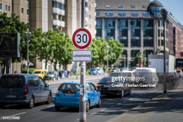 Traffic sign for speed limit and with the lettering 'Luftreinhaltung' is pictured in the city center on May 04, 2018 in Berlin, Germany.